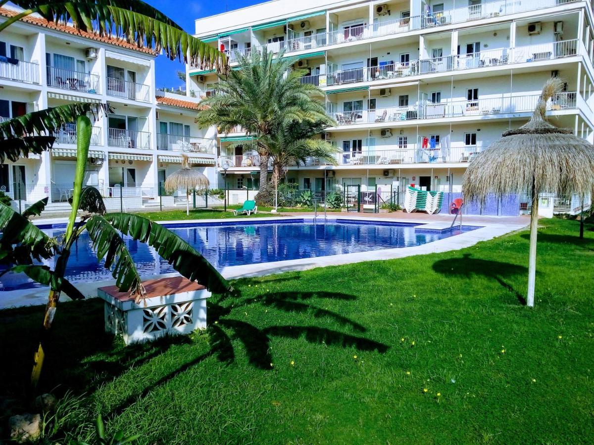 Apartamentos Caravane ตอร์เรโมลิโนส ภายนอก รูปภาพ