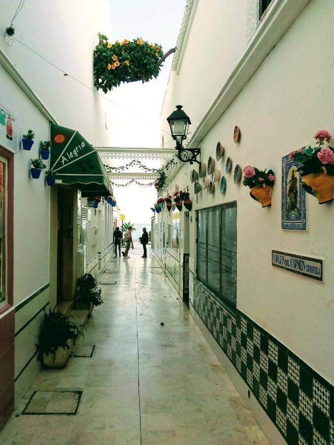 Apartamentos Caravane ตอร์เรโมลิโนส ภายนอก รูปภาพ